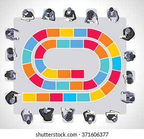 Colorful meeting table with business people around a board game path.
