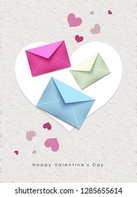 Colorful message envelopes on white texture background, love greeting card design for Valentine's Day.