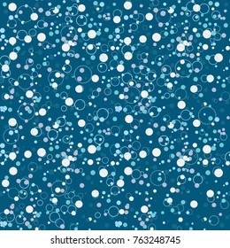 Colorful messy dots on blue background. Festive seamless pattern with round shapes - circle, rings. Dotted texture for wrapping paper, web. Vector illustration.