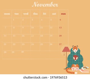 A colorful November 2022 diary featuring a cute tiger wrapped in a plaid blanket. Page with a calendar for November 2022 and a place to take notes. Vector illustration