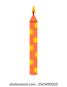 Colorful orange candle with polka dots lit and ready for celebration