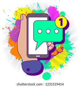 Colorful paint splashes with flat lay modern minimal hand holding mobile phone with new chat message notification on white background. Text new messaging minimalism design concept.
