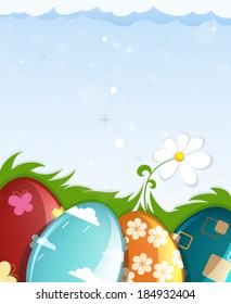 Colorful painted Easter eggs with abstract pattern  in the meadow