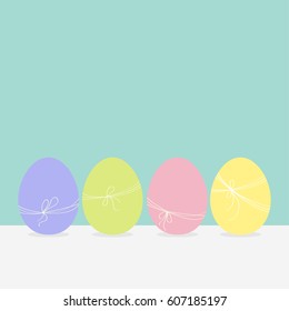 Colorful painting Easter egg set. Row of painted eggs shell with thread and bow. Light color. Blue pastel color background. Isolated. Greeting card template. Flat design. Vector illustration
