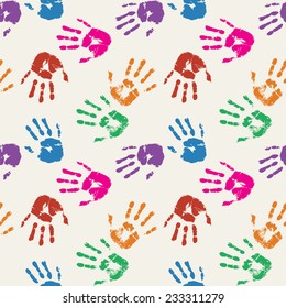 Colorful palm prints in bright colors. Seamless background. Vector illustration