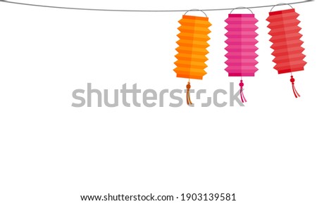 Colorful paper Chinese lanterns hanging on the rope. Traditional defying Chinese New Year celebrating. There’s a copy space for your text.