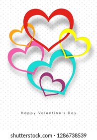 Colorful paper cutout style heart shapes on dotted background for Happy Valentine's Day greeting card design.