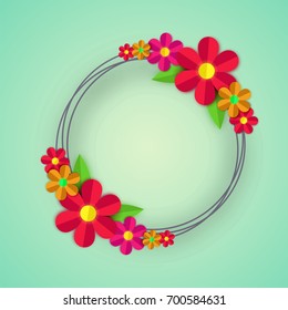 Colorful paper flowers on green background. 