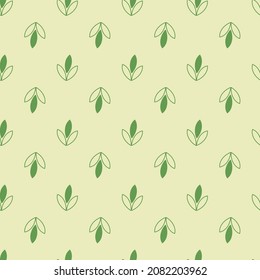 Patrón colorido con hojas frescas sobre fondo verde para impresión textil, papel de diseño. 