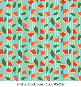 Colorful pattern made of slices of citrus fruits orange, lemon, lime, grapefruit and green leaves.