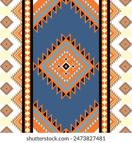 A colorful patterned rug with a blue diamond in the center. The rug is made up of different colored squares and triangles