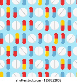 Colorful pills seamless pattern. Vector background. Seamless texture realistic tablets on blue background