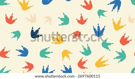 Colorful and playful seamless pattern of various dinosaur footprints scattered across a light beige background, perfect for kids.