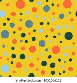 Colorful polka dots seamless pattern on bright background. Majestic classic colorful polka dots textile pattern. Seamless scattered confetti fall chaotic decor. Abstract vector illustration.
