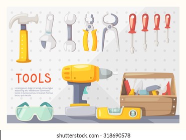 Colorful poster with carpenter's tools on garage wall