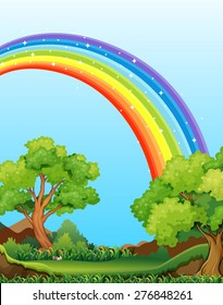 Colorful rainbow shining over the field
