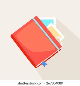 Colorful red journal or diary lying on instant photos or cards over a light grey background, vector illustration