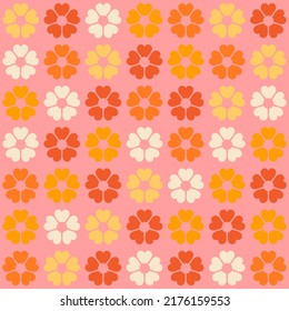 Colorful retro background. Geometric abstract seamless pattern . Vintage stylised flowers, placement by grid. Cheerful floral surface design print in old school 60s, 70s