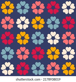 Colorful retro background. Geometric abstract pattern . Vintage stylised flowers, placement by grid. Cheerful floral surface design print in old school 60s, 70s
