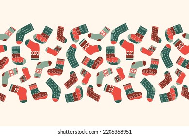 Colorful Retro Knitted Socks Vector Seamless Pattern Horizontal Border. Hand Drawn Fair Isle Knitwear Graphic Print. Winter Holiday Background. Red and White Christmas Doodle Design