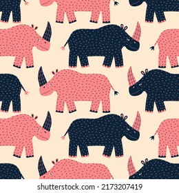 Colorful rhinoceros hand drawn vector illustration. Cute safari animals seamless pattern for children fabric or wallpaper.