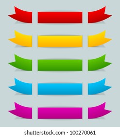 Colorful ribbons inserted into another piece of paper