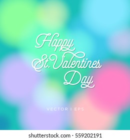 Colorful romantic greeting lettering for the Happy Valentine's Day on a blurred background.