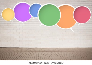 Colorful round vector speech bubbles with shadow, near brick wall with sidewalk