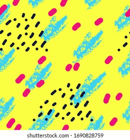Colorful seamless abstract hand drawn vector pattern. Trendy creative pop art design made in yellow, blue and pink colors. Brush splashes. Bright stylish retro palette. EPS10 vector.