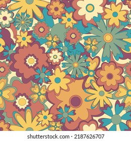 Colorful seamless floral pattern in hippie style in retro colors.