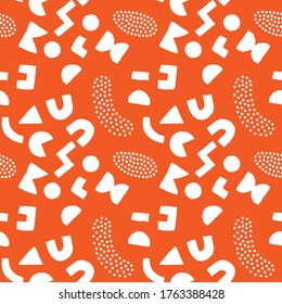 Colorful seamless pattern with bold geometric shapes and dots. Vector abstract background with modern Scandinavian cut out elements.