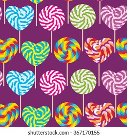 colorful seamless pattern, candy lollipops, spiral candy cane. Candy on stick with twisted design on purple dark violet background. Vector