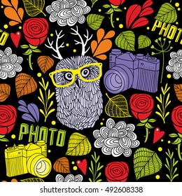Colorful seamless pattern with cute owl with horns and summer plants. Endless background in vector.