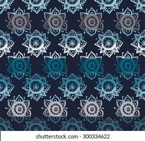 Colorful seamless pattern with floral elements separated by color stripes on dark background.