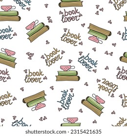 Colorful seamless pattern with hand drawn doodle cute pink cup on a stack of books with heart shapes and a Booklover lettering.