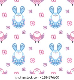Colorful seamless pattern with the image of Easter eggs, rabbits and birds. Vector background.