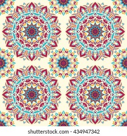 Colorful seamless pattern with mandala motifs in indian style. Patterned round design. Hand drawn