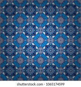 Colorful seamless pattern in mosaic style. Abstract hand drawn art, stylized floral doodle background in gray, violet and blue colors. Vector patchwork quilt pattern. Textile fabric paper print.
