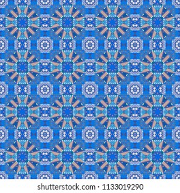 Colorful seamless pattern in mosaic style. Textile fabric paper print. Oriental ethnic ornament in yellow, violet and blue colors. Stylized floral doodle background. Vector patchwork quilt pattern.