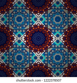 Colorful seamless pattern in mosaic style. Textile fabric paper print. Vector patchwork quilt pattern. Abstract hand drawn art, stylized floral doodle background in blue, red and gray colors.