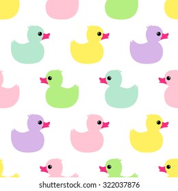 Colorful seamless pattern with multicolor rubber duck on white background. Duck toy baby shower illustration.