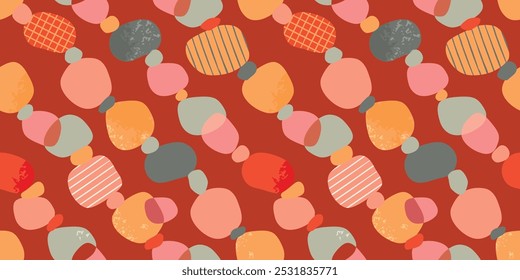 Colorful seamless pattern with rough round  shapes.Abstract background of grunge objects arranged in diagonal rows.Pink,yellow,orange,grey colors.Print on fabric and paper.Vector design for textile.