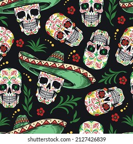 Colorful seamless pattern with sugar skulls with Mexican ornaments wearing sombreros, twigs anf flowers, vector illustration