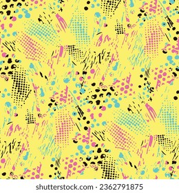 Colorful seamless pattern from triangles on the bright brush strokes background