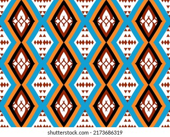 Colorful Seamless Pattern with Tribal Shape. Designed in Ikat, Aztec, Folklore, and Arabic Style. Ideal for Fabric Garment, Ceramics, Wallpaper. Vector Illustration.