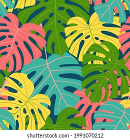 Colorful seamless pattern of tropical leaves on a dark background. Exotic multicolored monstera leaves. Vector illustration. 