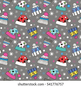 colorful  seamless pattern of winter hats and snowflakes in doodle style
