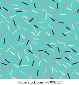 Colorful seamless sprinkles or jimmies pattern for donut or birthday cake themes. Teal blue background with pastel colored sprinkles