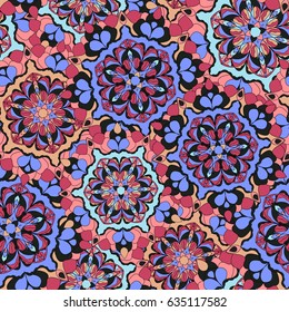 Colorful seamless texture of abstract flowers, vector. Mandala seamless pattern. Vintage decorative elements.  Kaleidoscope, medallion, yoga concept. Oriental style.