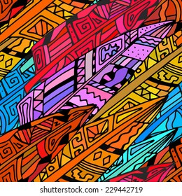 Colorful seamless texture with ornaments from bird feathers in tribal style. Feathers. Vector illustration.